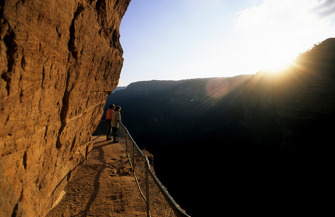 Two people, Tourists enjoying the view, National Pass near the village of Wentworth Falls, Blue Mountains National Park, New South Wales, Australia