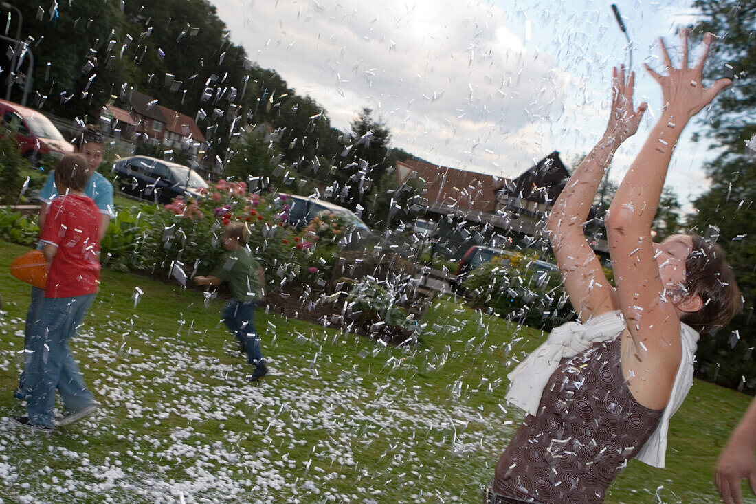 Confetti rain during wedding-eve party, Hauneck, Hesse, Germany