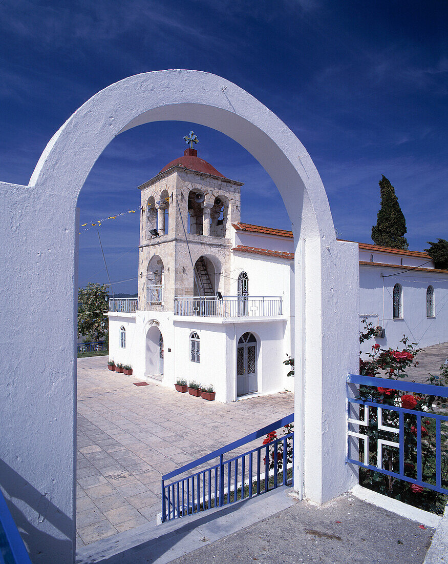 Archway and church. Kalandra. Chalkidiki. Greece
