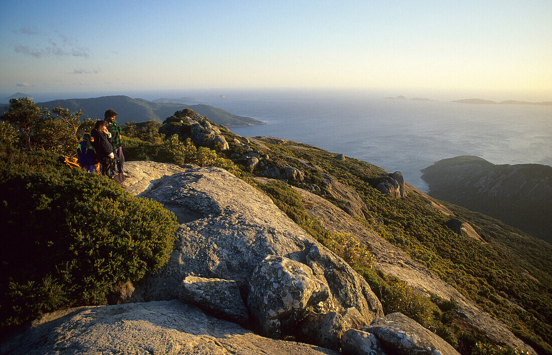 A group of people on top of Mt. Oberon, Wilsons Promontory National Park, Victoria, Australia