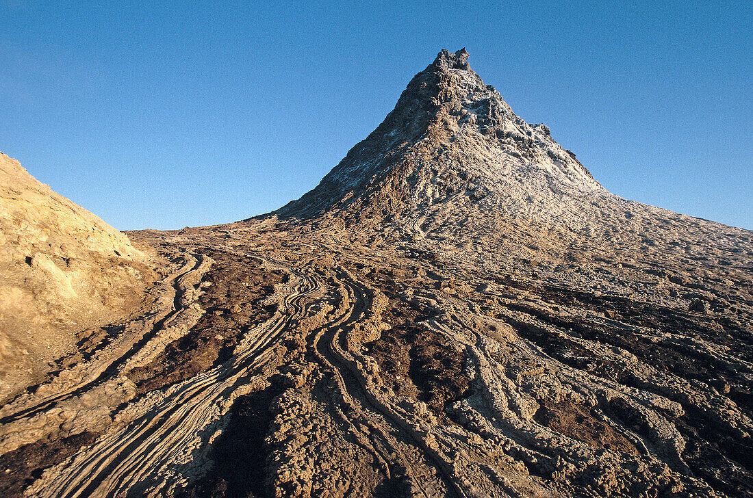 Solid and flowing lava at Oldonyo Lengai volcano. Great Rift Valley. Tanzania