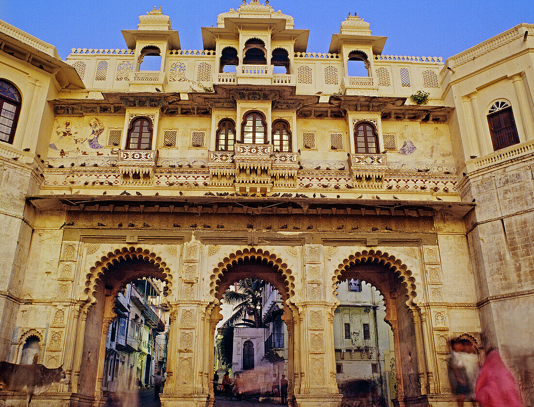 Facade Detail of carved stonework window casements on the Tripolia Gate of Gangaur Ghat. Udaipur. Rajasthan. India