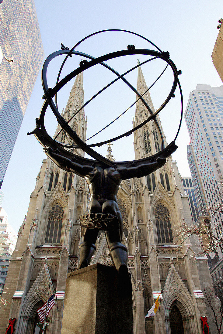5th Avenue, statue of Atlas and cathedral of Saint Patrick. New York City. USA