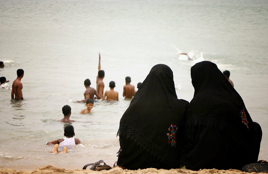 Muslim women on the beach. India