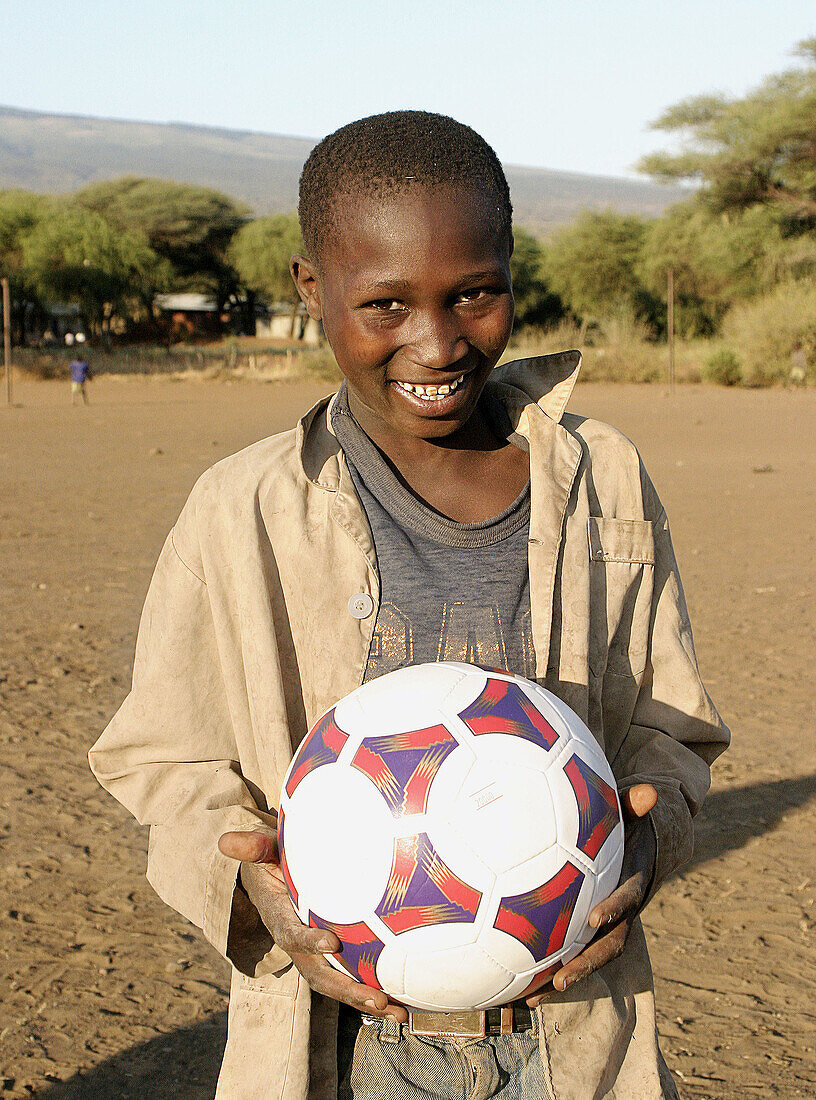 African child with ball, Tanzania