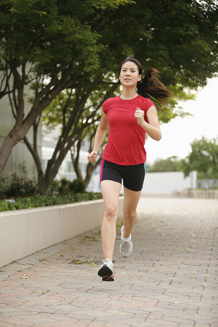 Arlington, Virginia, USA, woman jogging, 23 years old, Asian.