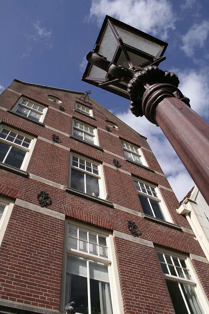 Street light and dutch house, Spui, Amsterdam. Netherlands.