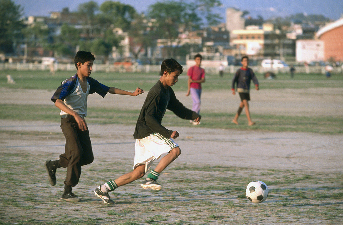 Playing soccer. Katmandu. Katmandu valley. Nepal