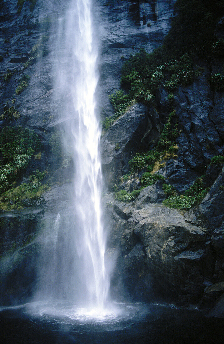Waterfall. Milford Sound fiord. Fiordland National Park. South Island. New Zealand