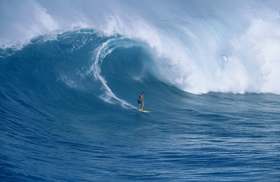 Surfing Jaws , a 30 wave on the north shore of Maui, Hawaii