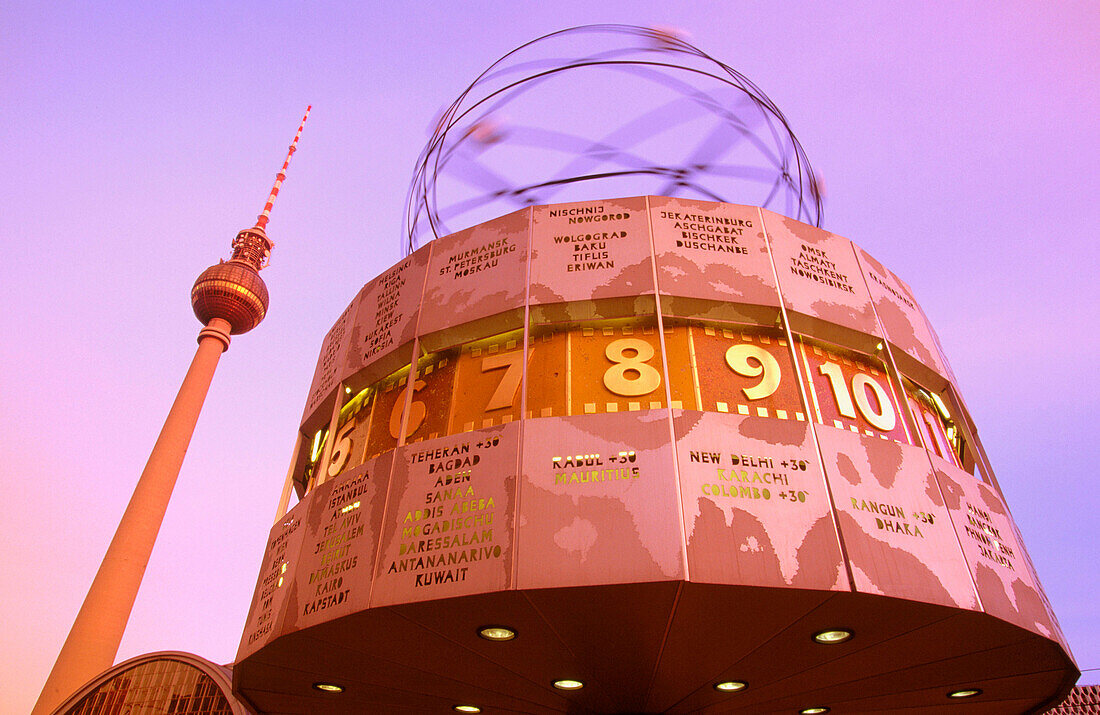 The Universal Clock Urania and Television Tower. Alexanderplatz. Berlin. Germany