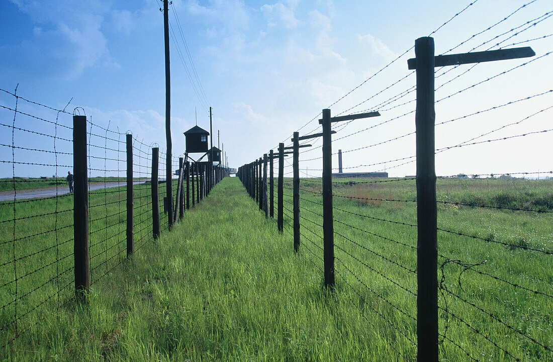 Barbed wire and watchtowers at Majdanek Concentration Camp. Lublin. Malopolska. Poland