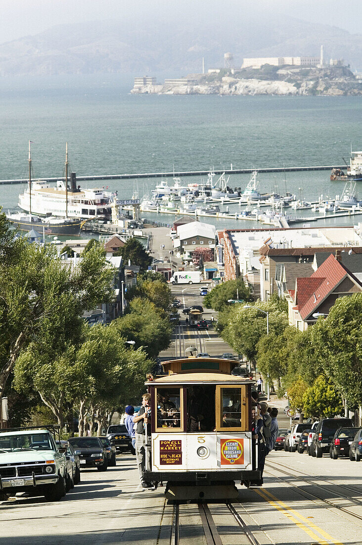 Cable car and Alcatraz Island in background. San Francisco. California, USA