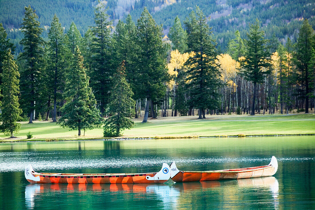 Indian canoes at Lac Beauvert. Jasper National Park. Alberta, Canada