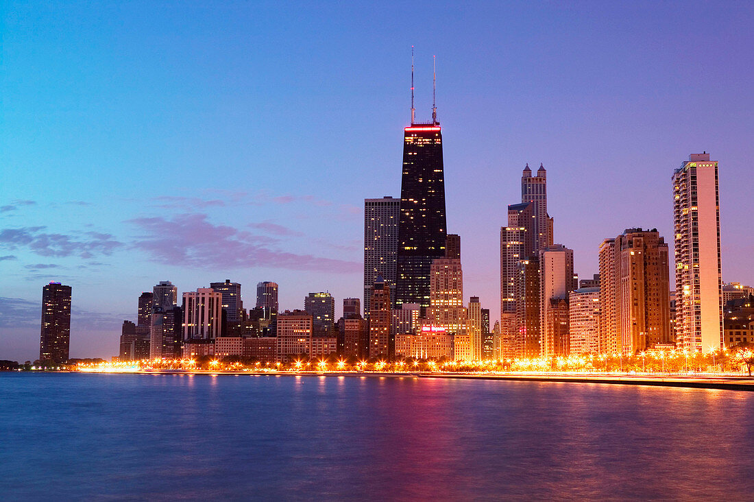 Dawn view of North Lake Shore Drive and John Hancock Tower from North Avenue Beach. Chicago. Illinois, USA