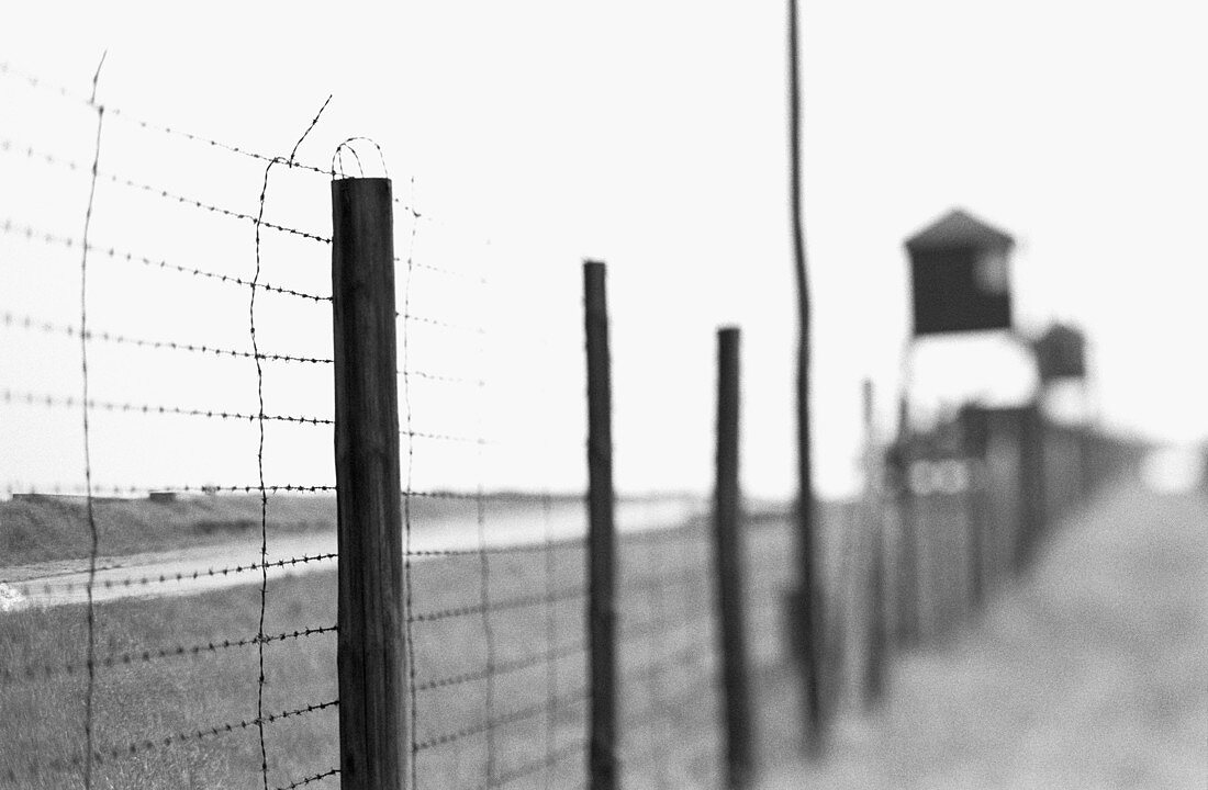 Barbed wire and guard towers at World War II Majdanek concentration and extermination camp. Lublin. Malopolska, Poland