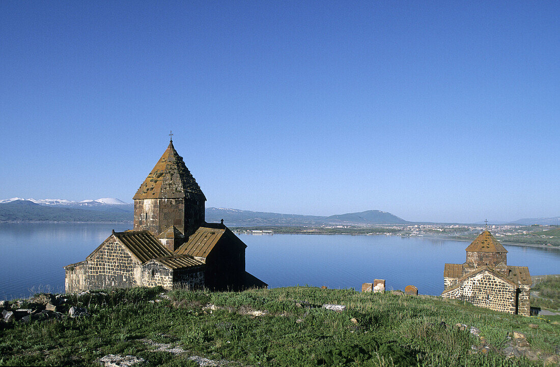 Sourb Arakelots (Holy Apostoles) and Sourb Astvatsatsin (Mother of God) churches by Lake Sevan. Armenia