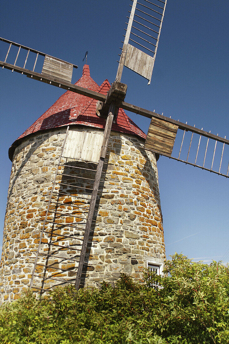 Windmill circa 1830 built on Isle aux Coudres region of Charlevoix, Quebec. Canada.