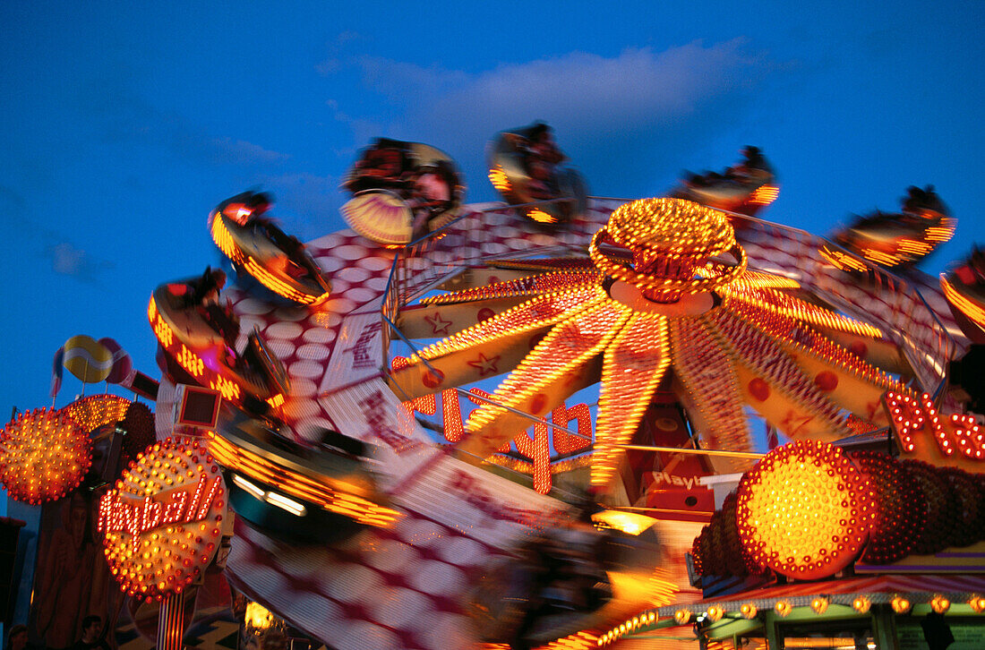 Carnival ride during Oktoberfest. Munich. Germany