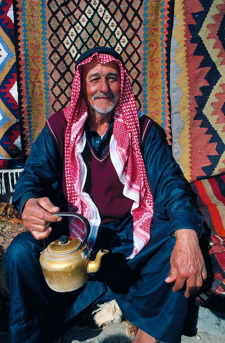 Bedouin with teapot. Syria