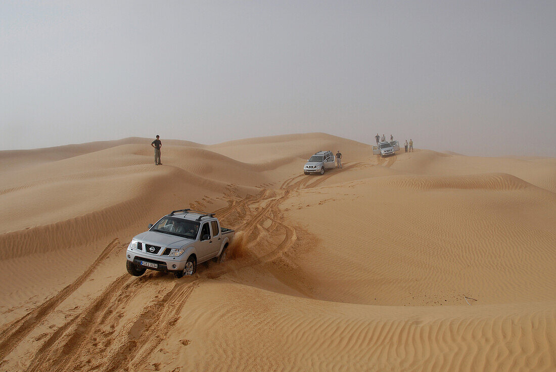 4x4 vehicle, jeep driving over sand dunes in the desert, Offroad 4x4 Sahara Desert Tour, Bebel Tembain area, Sahara, Tunisia, Africa, mr