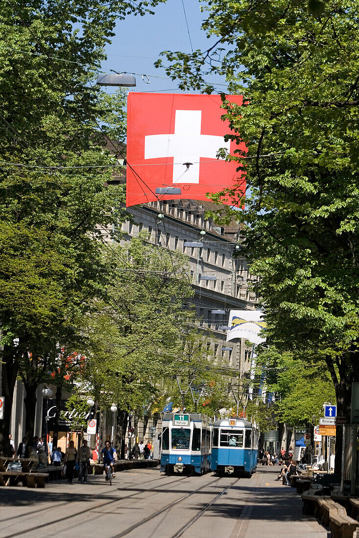 Switzerland,Zurich, Bahnhofstrasse,tram, swiss flag, people , shopping area