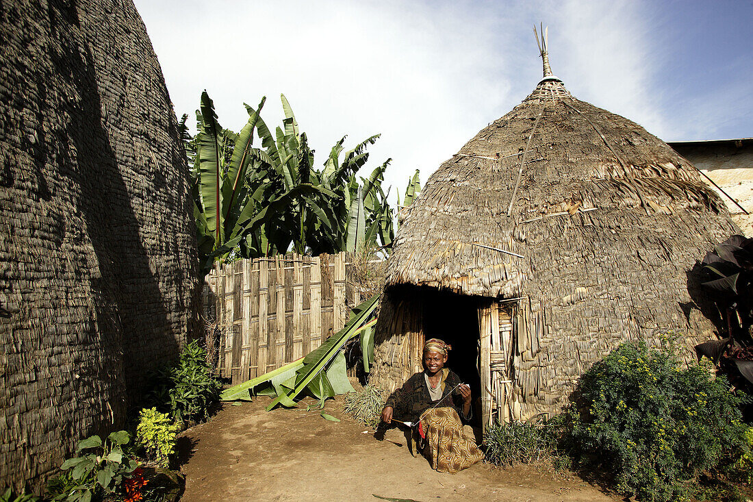 Young girl Dorse (Ethiopian tribe) spinning cotton. Arsi. Ethiopia.