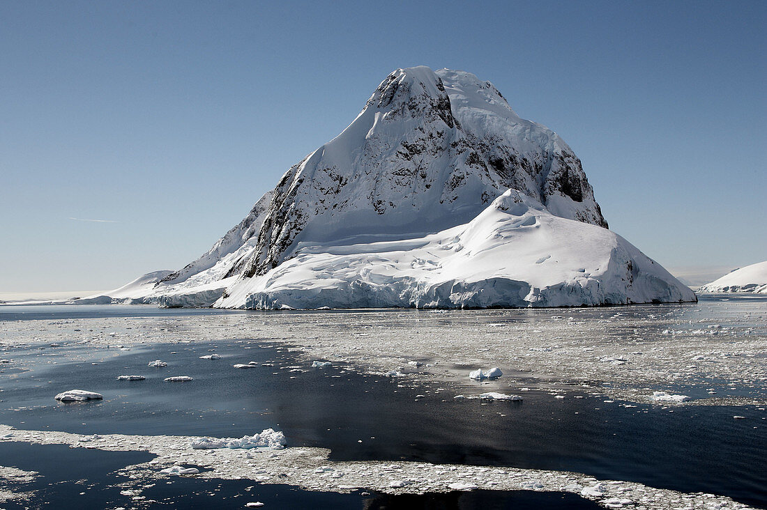 Lemaire Channel with Petermann Island in the background. Antartic Peninsula