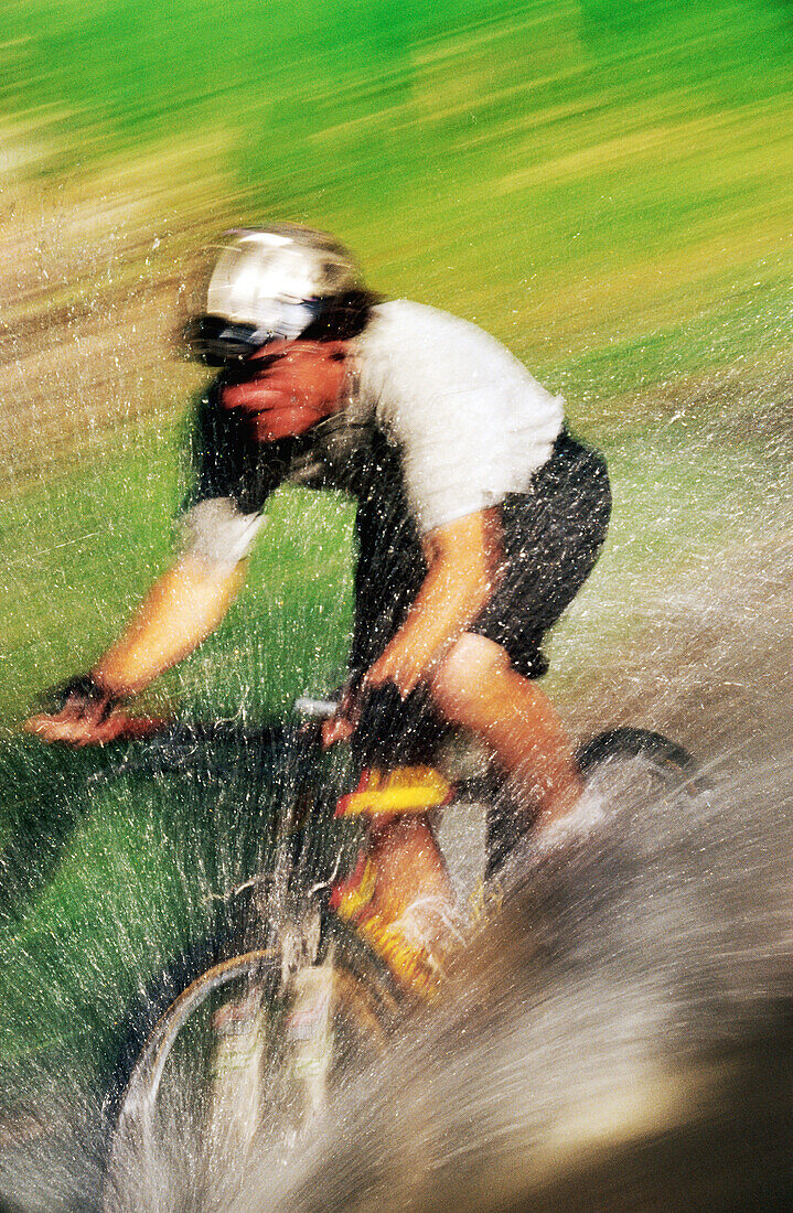 Mountain biking in stream