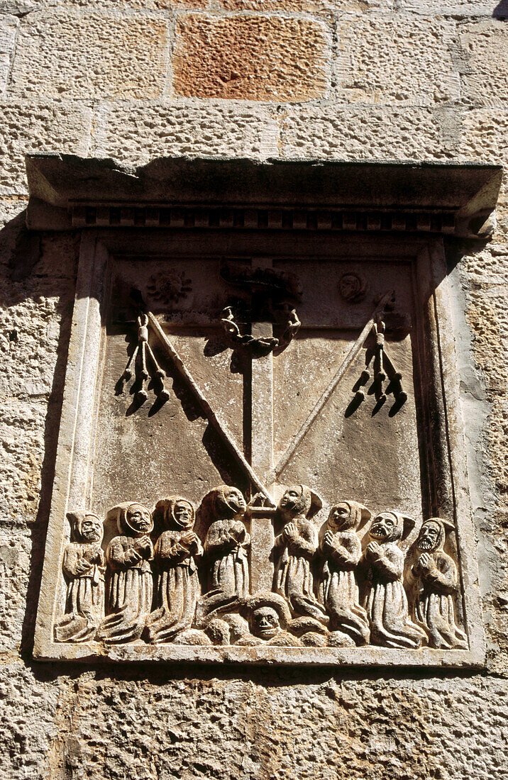 Bas-relief emblem of the All Saints brotherhood, town of Korkula. Korcula Island, Dalmatia. Croatia