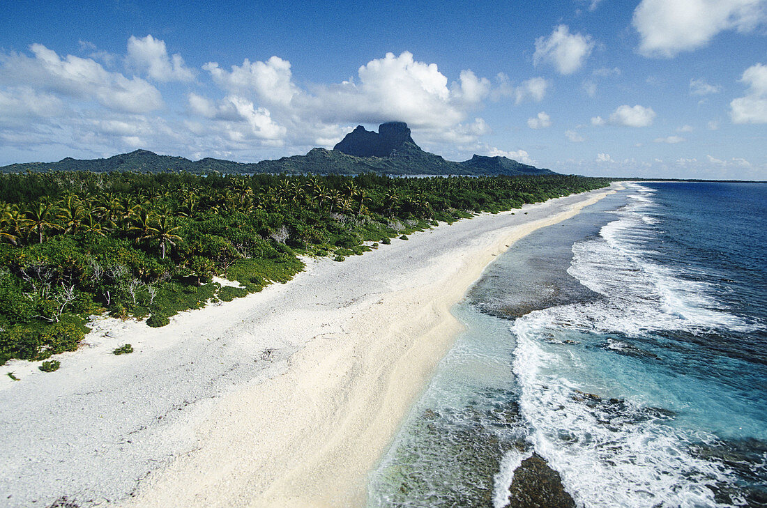 Motus (little islands), barrier and lagoon in Bora Bora. Leeward Islands, French Polynesia