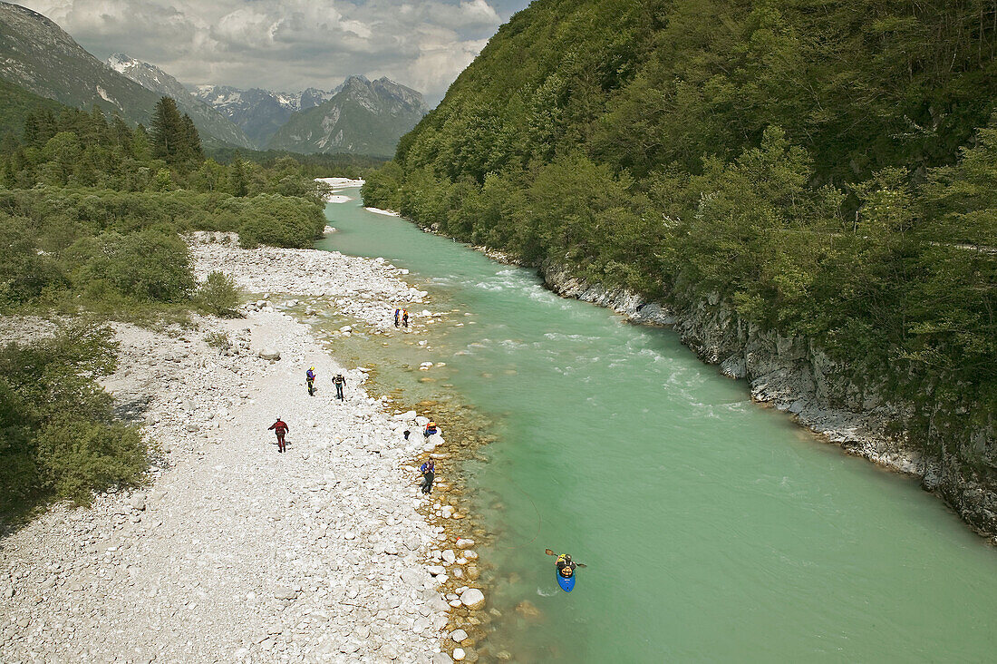 Turquoise Waters of the Soca River. Julian Alps with Kayakers. Soca. Primorska. Slovenia.