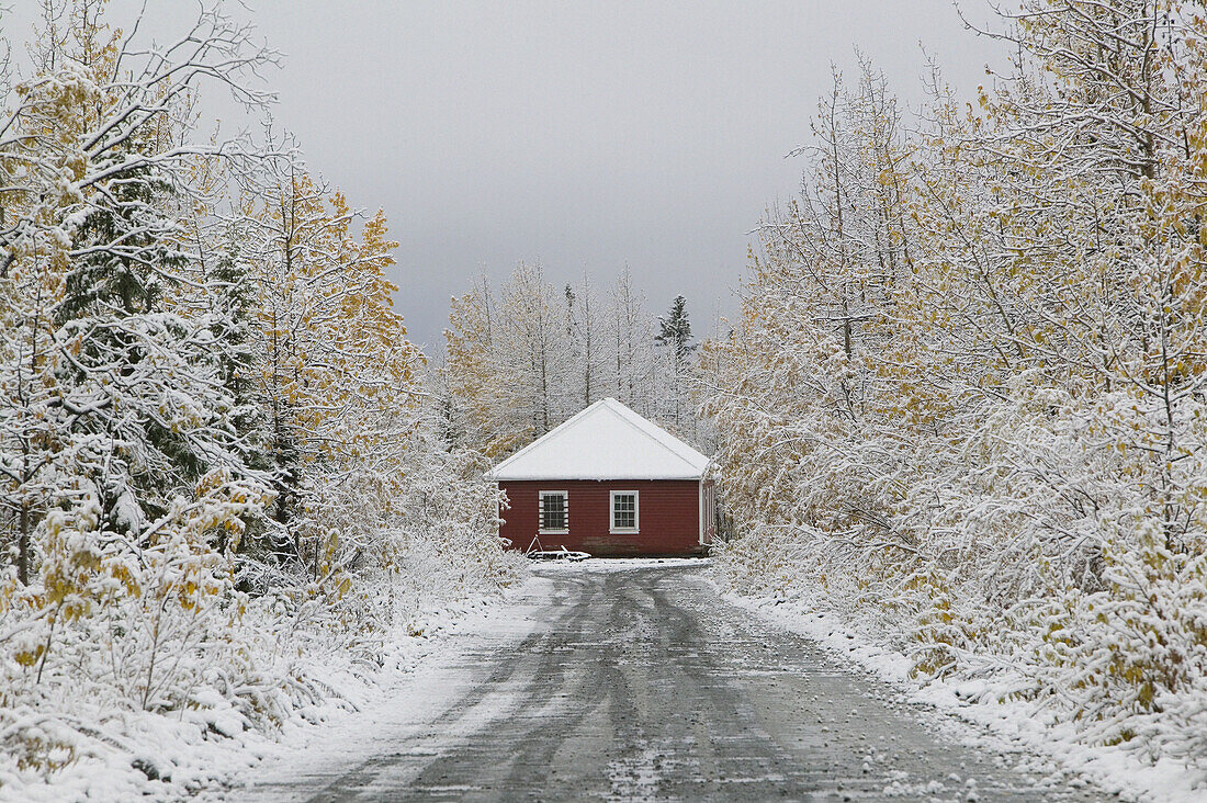 Red Building covered with snow. Winter. McCarthy. Interior. Alaska. USA.