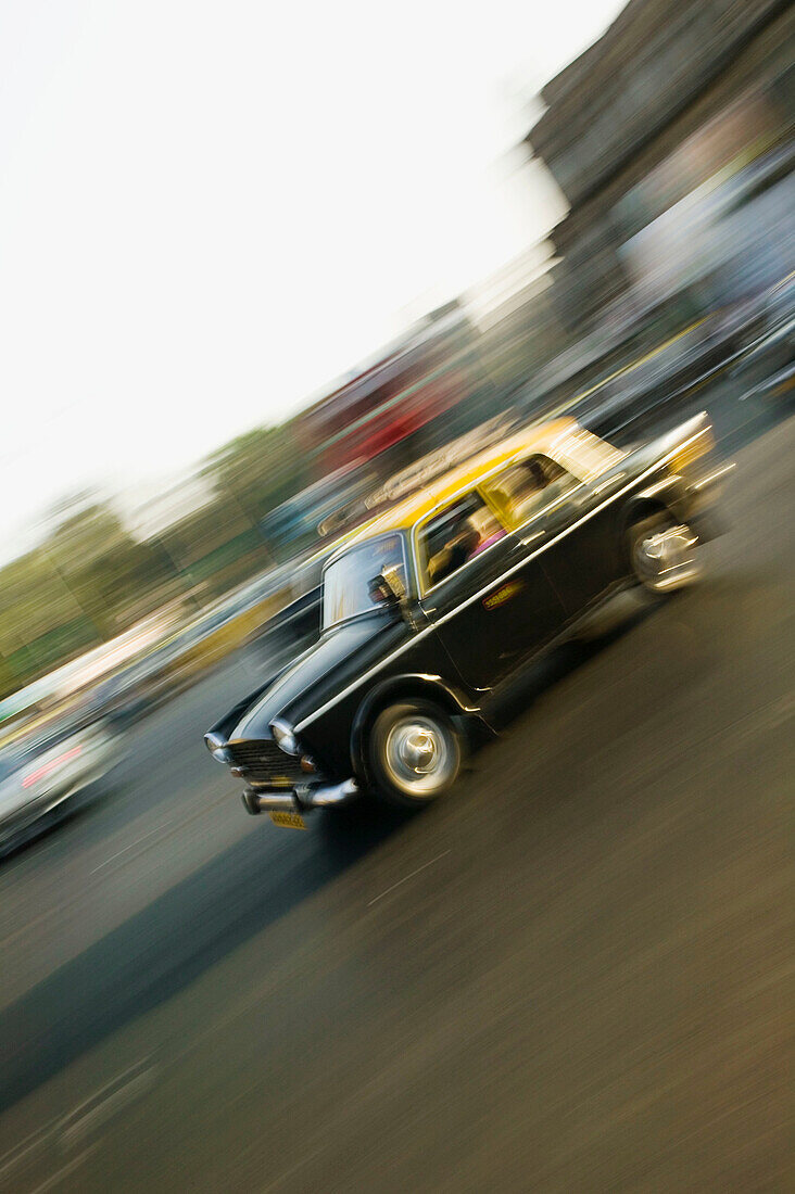 Speeding Mumbai taxi, Bombay. Maharashtra, India (2004)