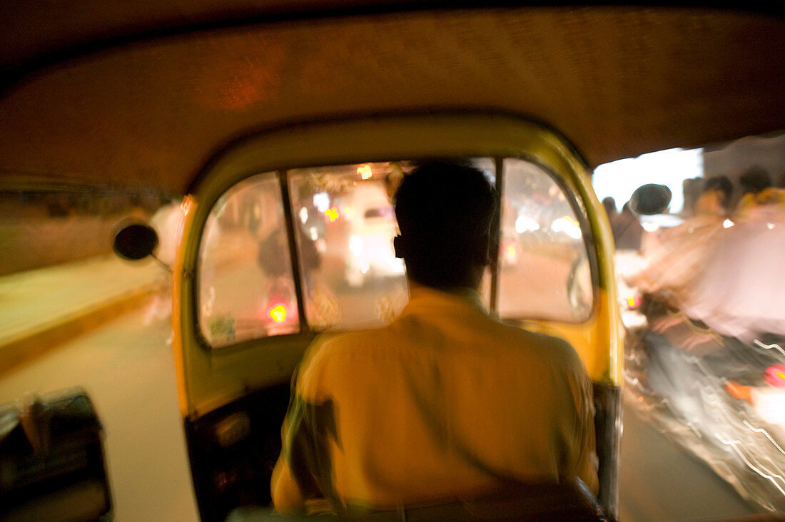 Evening Traffic from Autorickshaw Taxi. Passenger s View. Bangalore. Karnataka. India.
