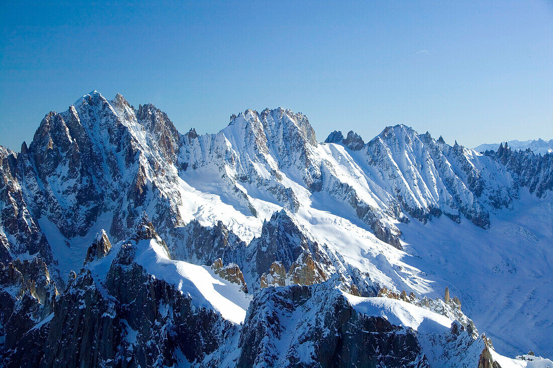 View of the Alps from Aiguille du Midi (elev. 3842meters) / Winter. Chamonix. Mont-Blanc. Haute-Savoie. French Alps. France.