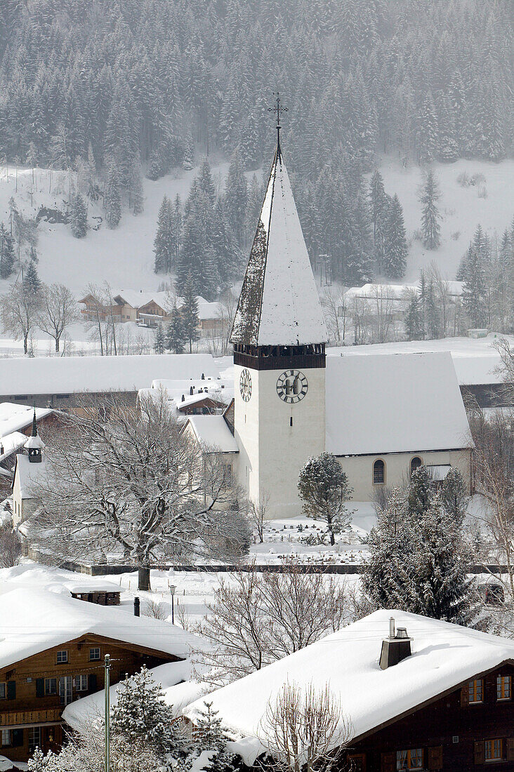 Town Church with Fresh Snow Morning / Winter. Saanen (Area around Gstaad). Bern. Switzerland.