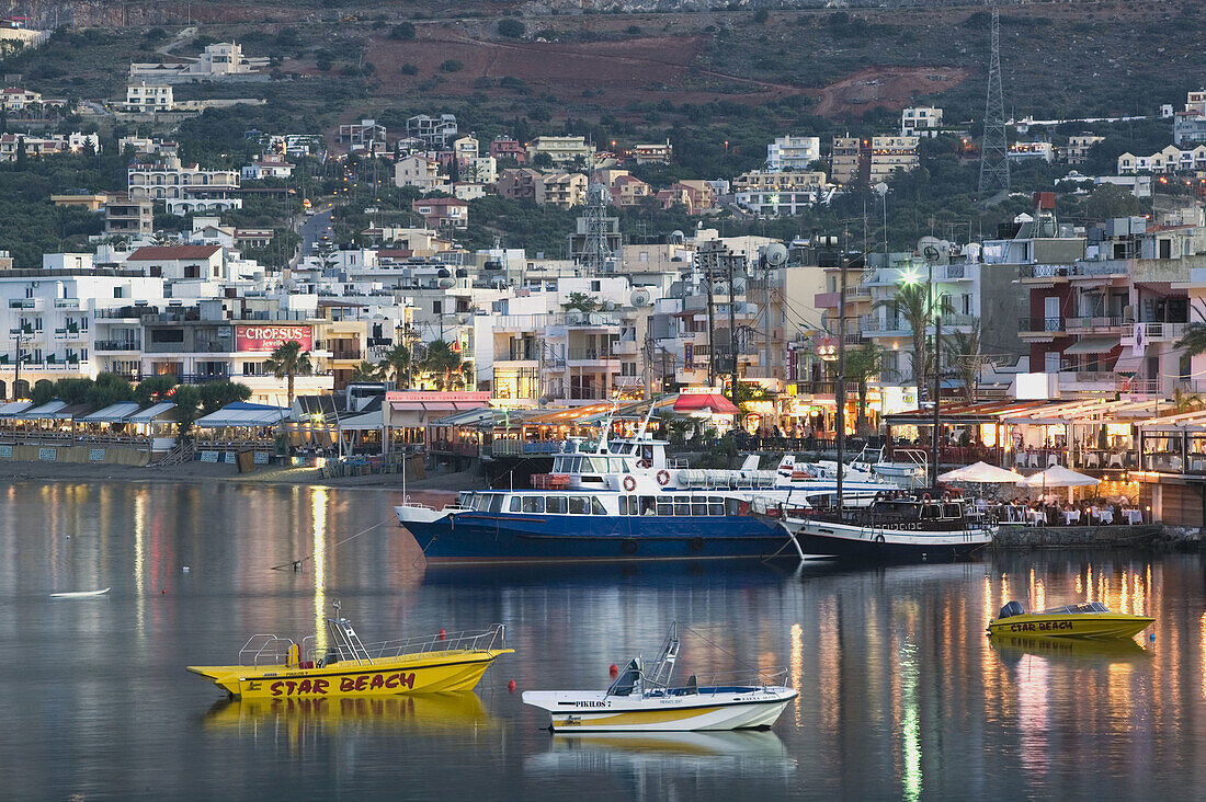 Resort town view. Dusk. Hersonissos. Iraklio Province, Crete. Greece.