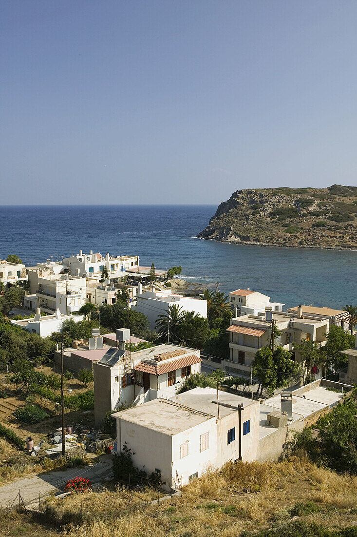 Resort town view with Agios Nikolaos Island. Mohlos. Lasithi Province. Crete. Greece.