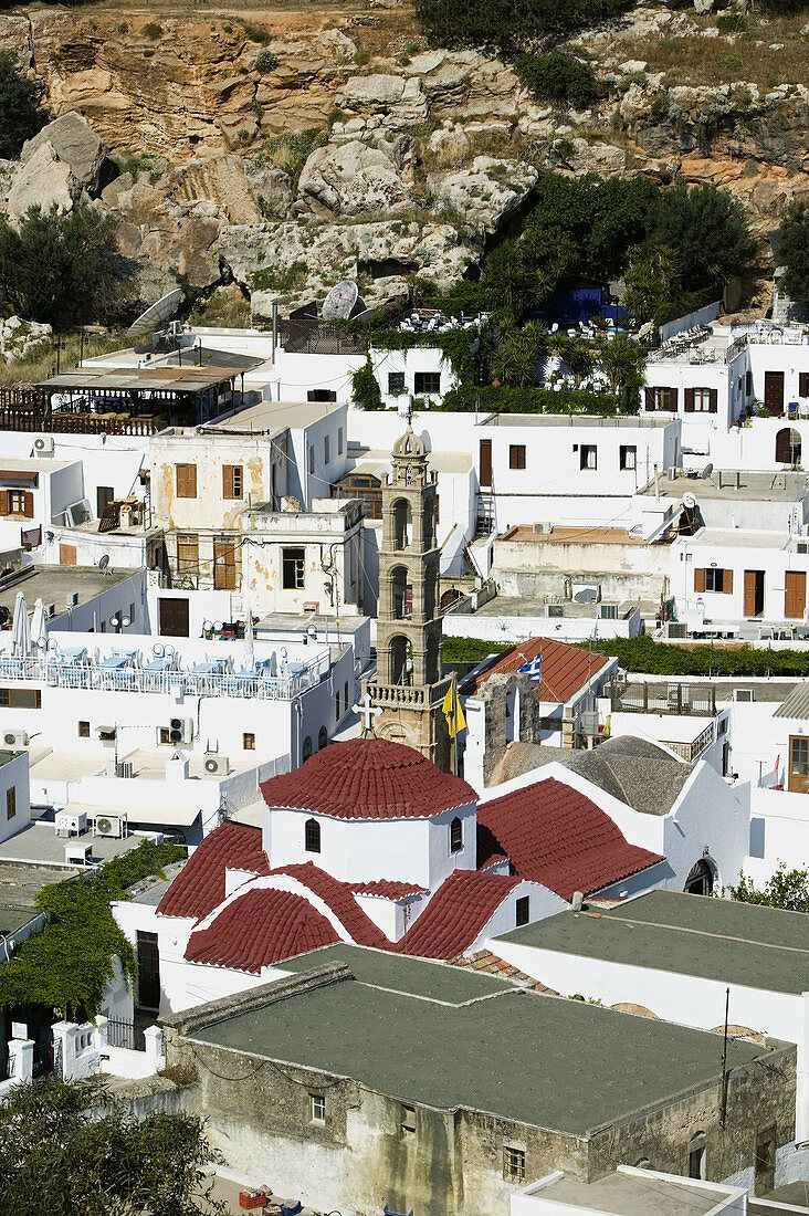 Town view with church of Agia Panagia seen from the Acropolis of Lindos. Rhodes. Dodecanese, Greece