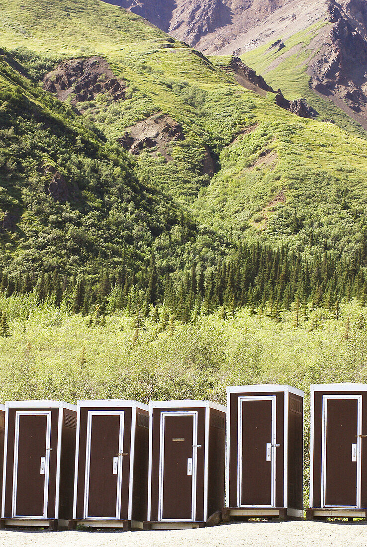row of outhouses in Alaska