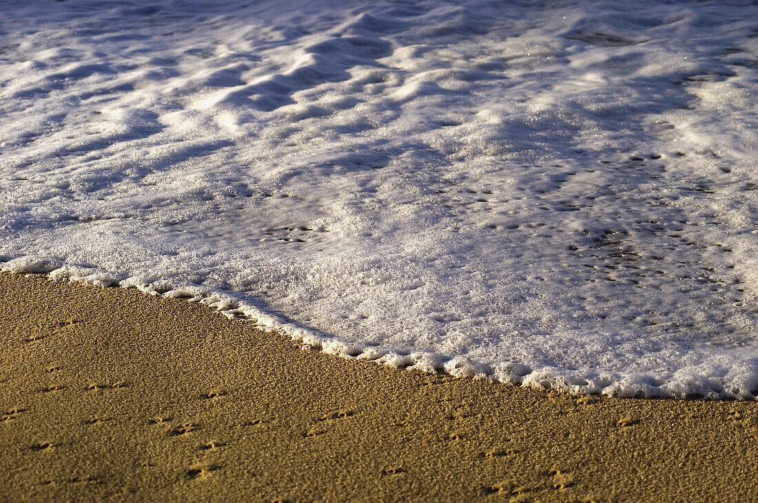 White water and beach sand