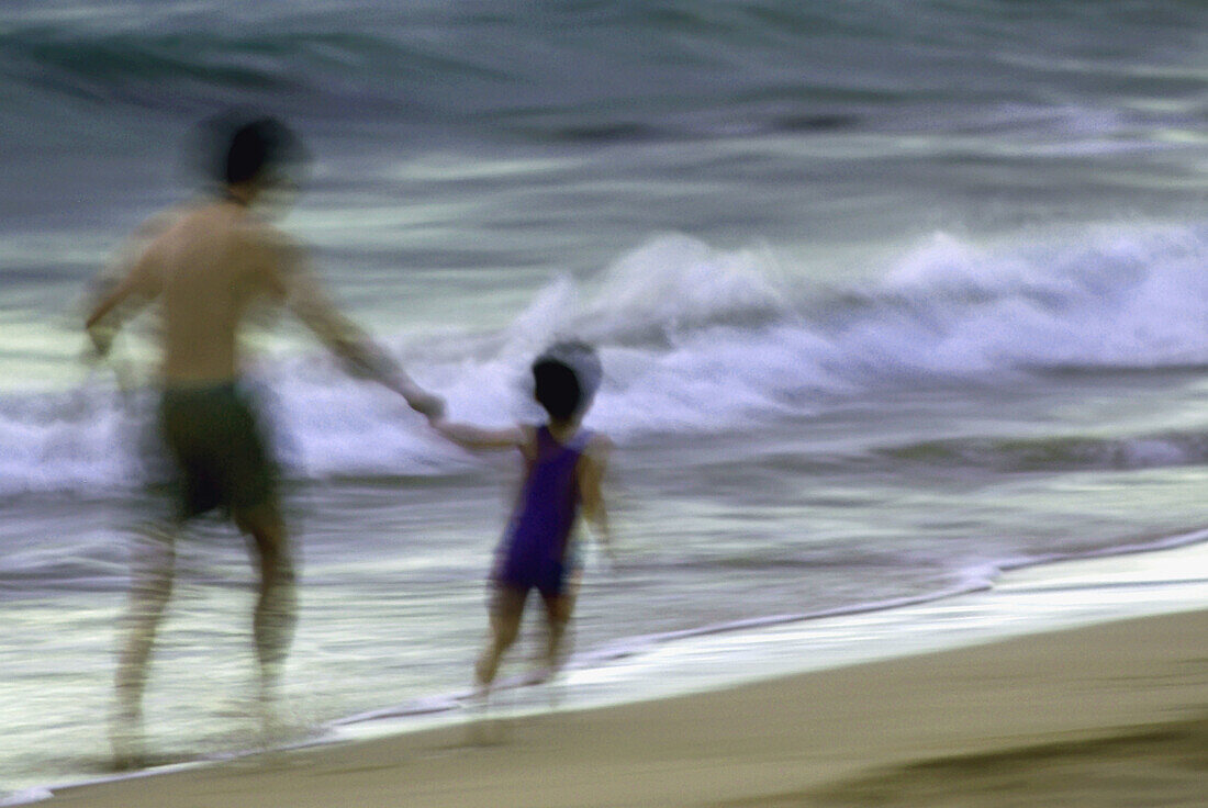 Father and son at beach