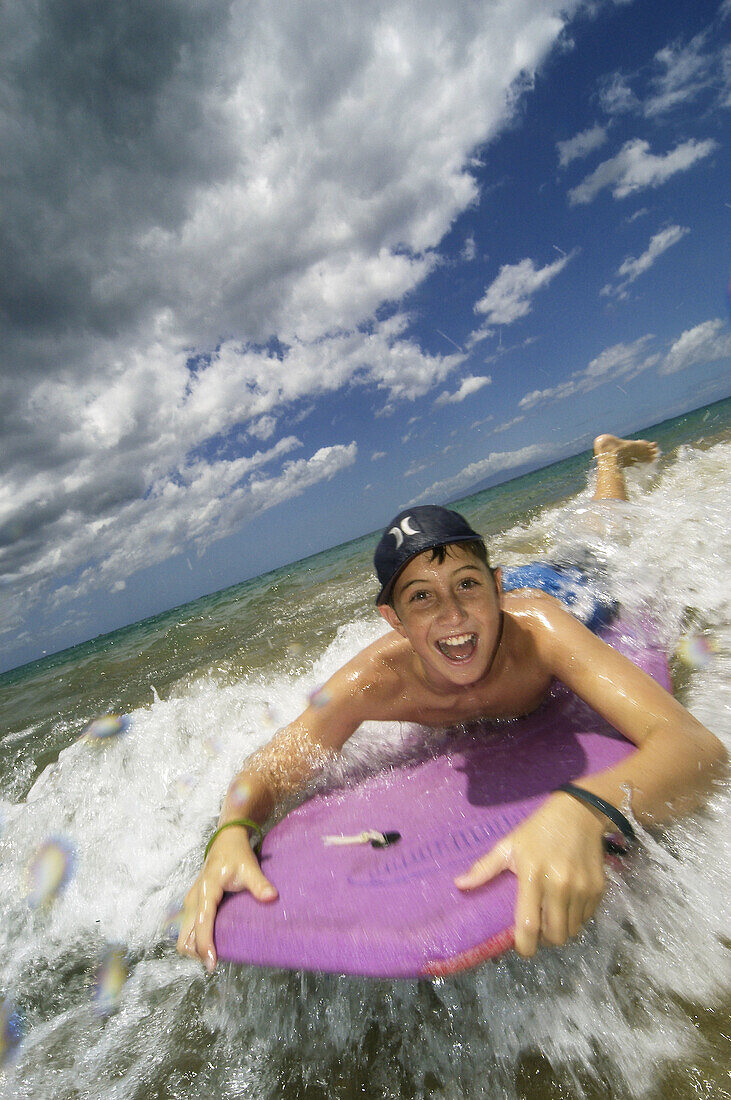 Boy on boogie board