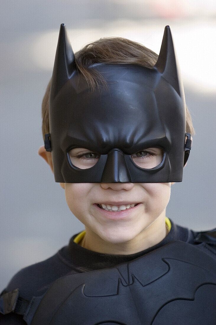 Boy in Batman costume