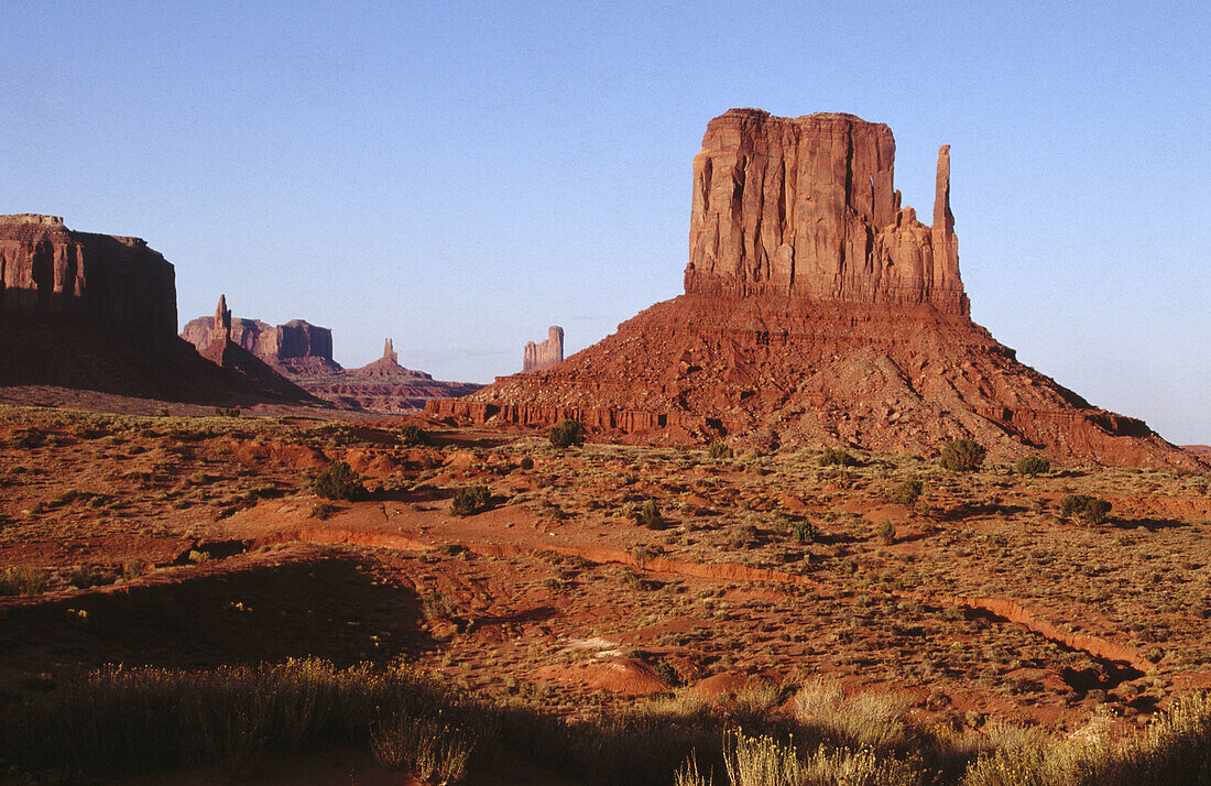 Monument Valley, USA. Mitten formation with valley formations in background