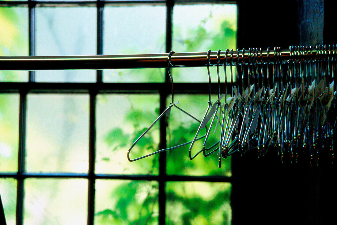 Hangers on a coat rack in a restaurant