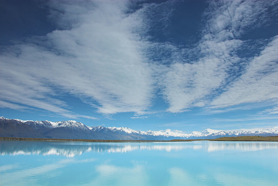 Tekapo Canal (hydro scheme), looking towards Mt Cook with lenticular north-west cloud patterns, New Zealand