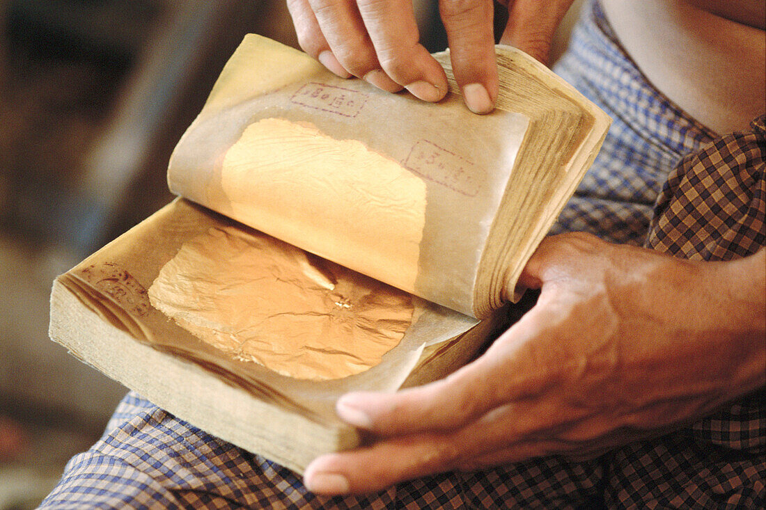 Gold leaves production. Mandalay. Myanmar.