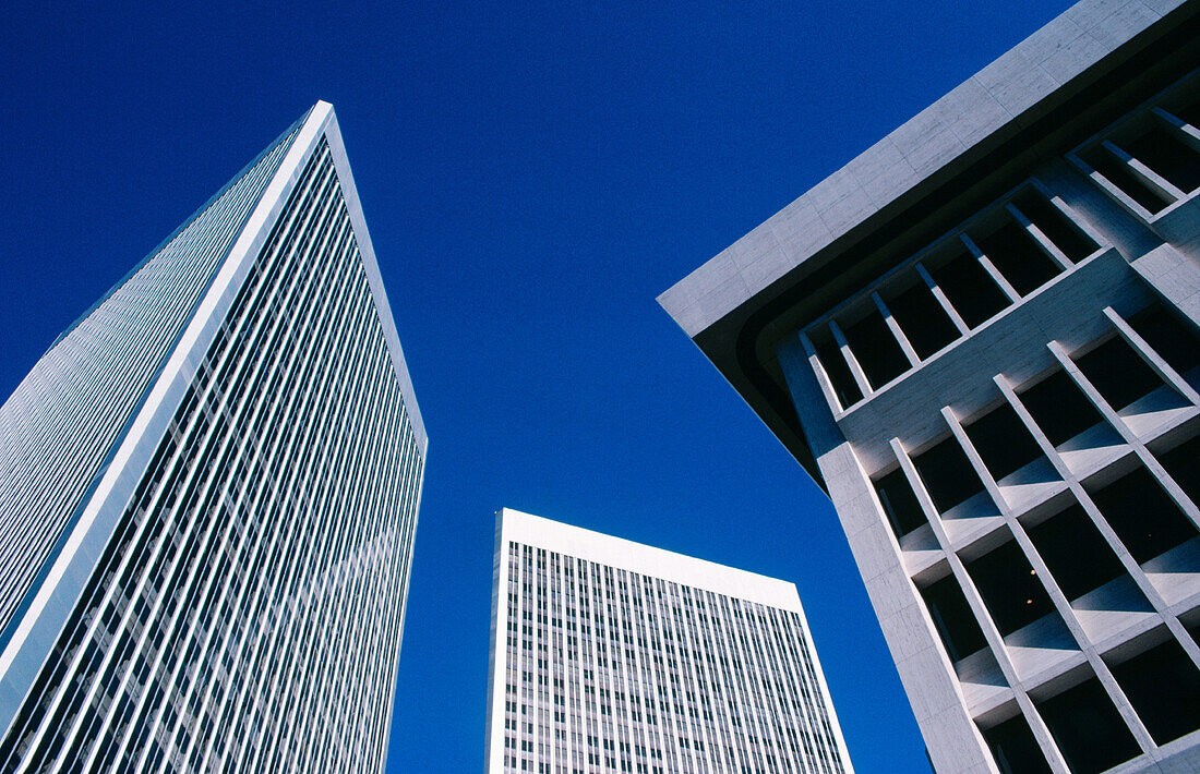 Office buildings of varying architectural design, against deep blue sky, Century City, Los Angeles